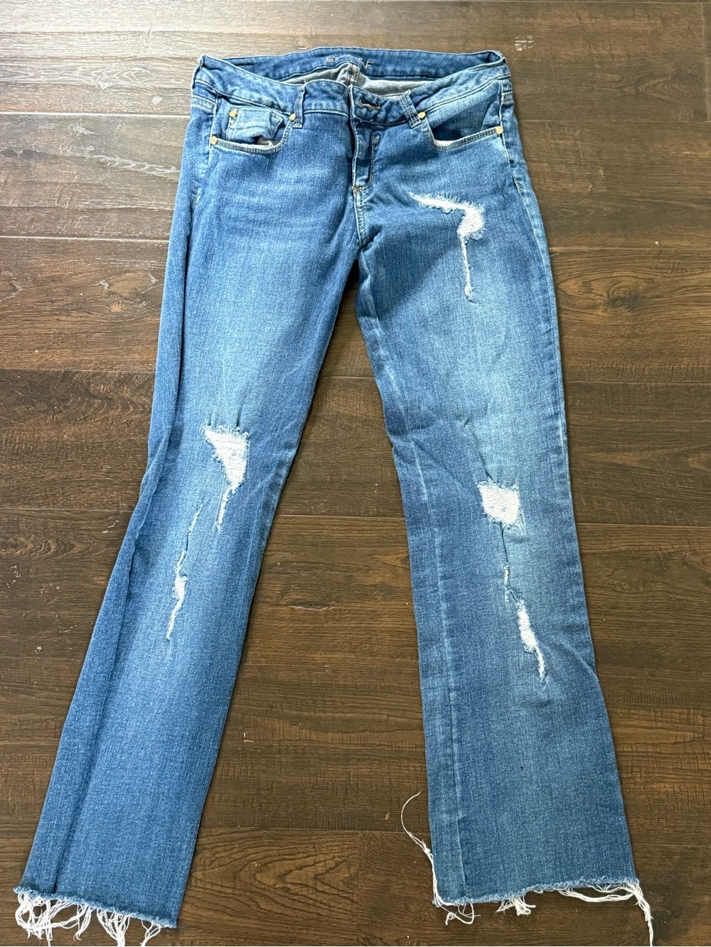 Distressed Blue Flare Jeans — Unbranded